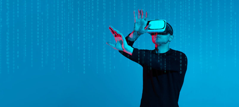 VR, AR, MR, XR-  Future technology. Neon. European man's in VR-glasses in neon on gradient background. Male portrait. Concept of human emotions, facial expression, modern gadgets and technologies