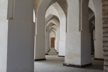 SAMARKAND, UZBEKISTAN-NOVEMBER 2019: columns of one of the madrassas