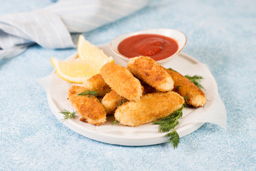 Homemade chicken nuggets with tomato sauce, selective focuse