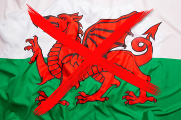 Crossed out flag of Wales, curfew concept