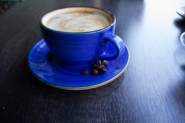 TASHKENT, UZBEKISTAN- FEBRUARY 1, 2019: a Cup of Latte at a local coffee shop