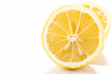 Fresh juicy lemon on white background with copy space for your design. Healthy food concept.