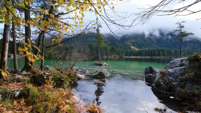 Mountain alpine autumn lake Hintersee, Berchtesgaden national park, Deutschland, Alps, Bavaria, Germany. Picturesque traveling, seasonal and nature beauty concept scene.