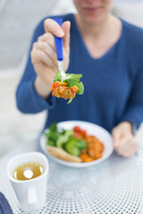 Fototapeta na wymiar hand of young woman show healthy food