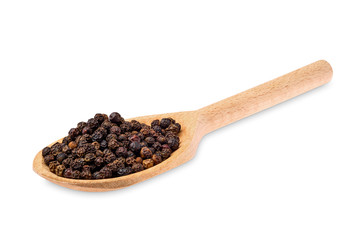 Wooden spoon with pepper isolated on white