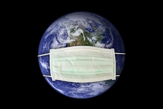 Planet earth sick wearing a surgical mask. New coronavirus, covid-19 worldwide epidemic crisis concept - Elements of this image furnished by NASA.