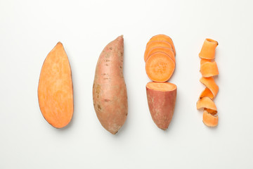 Flat lay with sweet potato on white background, top view - Powered by Adobe