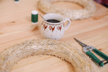 Base for Christmas wreath. Christmas decorations. Christmas wreath. Florist making Christmas wreath.