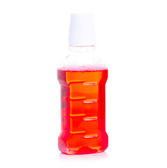 Plastic bottle of mouthwash on white background isolation