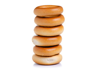 Small bagels drying on white background isolation