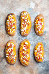 Sandwiches with baked pumpkin, cheese and pomegranate