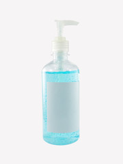 hand sanitizer in transparent bottle with pump lid and blank label isolated on white