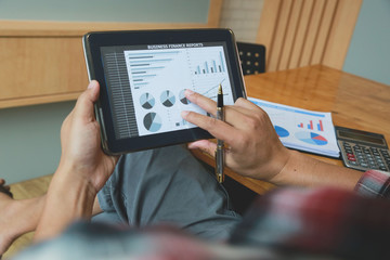 Businessman analysts make decisions about the US economy that affect future operations of the company.