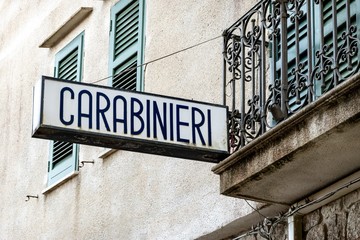 The sign of Carabinieri, Italian police, at historical Sicilian city