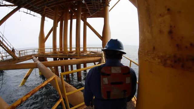 walking Inside oil drill rig platform on the sea