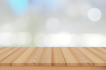 wood plank table on silver and white blur and bokeh soft style for design  banner and background or display product.