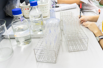 Scientist holding Test tube with blood sample for COVID-19 test,Experiment to detect virus was found in the blood,Developers of potential medicines and vaccines against COVID-19
