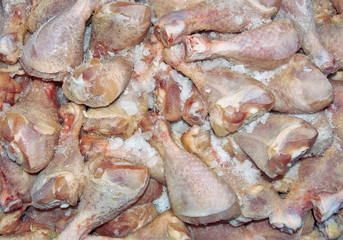 many chicken legs at the market