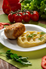 Cutlet in Kiev. Cutlets in breadcrumbs, stuffed with butter and herbs, served with potatoes. Still-life