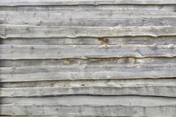 Fototapeta na wymiar Rustic old wooden fence, detail.