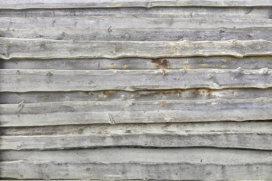 Rustic old wooden fence, detail.