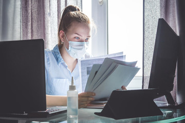 Coronavirus. Quarantine. Online training education and freelance work. Computer, laptop and girl...