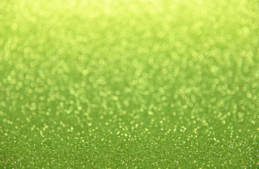 Abstract background of green bokeh lights