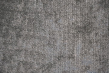 Close-up to wool grey fabric texture background.