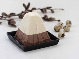 Easter cottage cheese three chocolates on a light background