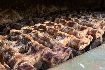 Detail of rusty armor chain of old soviet tank
