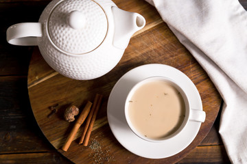 traditional indian masala tea with spices and milk