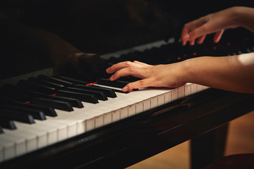A woman playing the piano