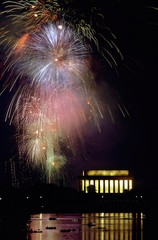 Washington, DC. USA,  July 4, 1989.Annual fIreworks display over the Lincoln Memorial as seen from the Virginia side of the Potomac River. .