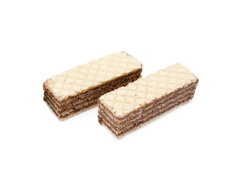 Crispy wafers with creamy hazelnut filling isolated on white background