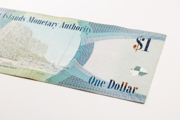 Fototapeta na wymiar Cayman Islands dollar banknote, the national currency of the Cayman Islands, one dollar of Cayman Islands Monetary Authority