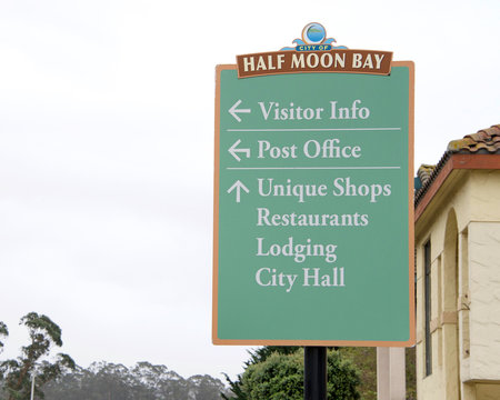 Half Moon Bay, CA - Oct 19, 2019: City Sign for Half Moon Bay, where thousands flock to the streets annually for their  annual Art and Pumpkin Festival and Parade.