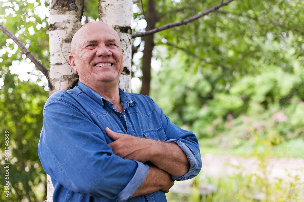 Poster portrait of   elderly man in   denim shirt