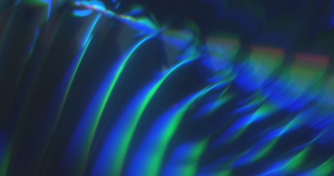  abstract dynamic blue background in the form of aberration and glare from glass and crystal