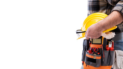 Electrician with tool belt on a white background. Electricity.