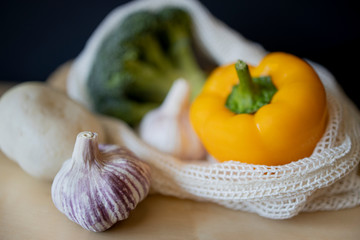 Fresh vegetables on a wooden table.