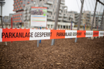 Vienna, Austria - 03.17.2020 Playground closed due due Corona virus crisis. German words...