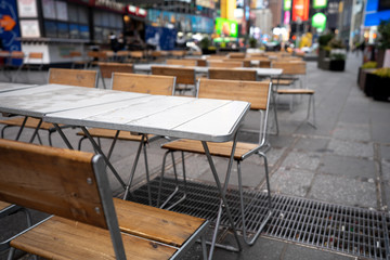 Empty tables on Times Square during New York city lockdown, coronavirus quarantine