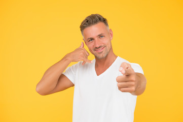Call me right now. Happy man show call me gesture pointing finger. Call centre service. Sales call....