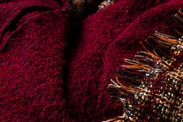 Wrinkled squared red color cloth  fragment. Background texture