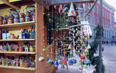 Fototapeta na wymiar Clayware and other traditional souvenirs displayed for sale at the Christmas market