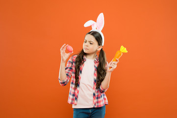 Fun and educational Easter activity for kids. Little girl easter eggs. Preparing decorations. Cute bunny schoolgirl celebrate Easter day. Only fun on my mind. Indoor and outdoor holiday activities
