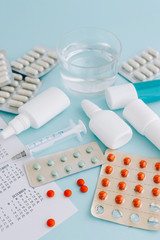 Set of pills and bottles of nose drops for treatment various viruses symptoms. Treatment of seasonal allergic rhinitis.