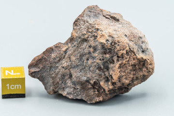 Chondrite Meteorite L6W2 Type isolated, piece of rock formed as an asteroid in the universe at during Solar System creation. The meteorite comes from an asteroid fall impacting Earth at Atacama Desert © abriendomundo