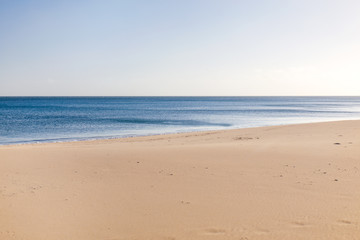 Fototapeta na wymiar abandoned lonely beach near the ocean during quarantine