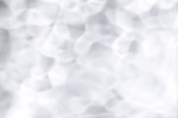 Obraz premium Shadows made with water. Blurred background made with water and light in monochrome. Pureness concept.